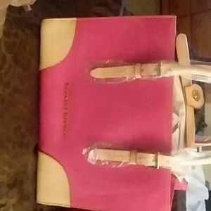 Purse is patent fuscia  leather